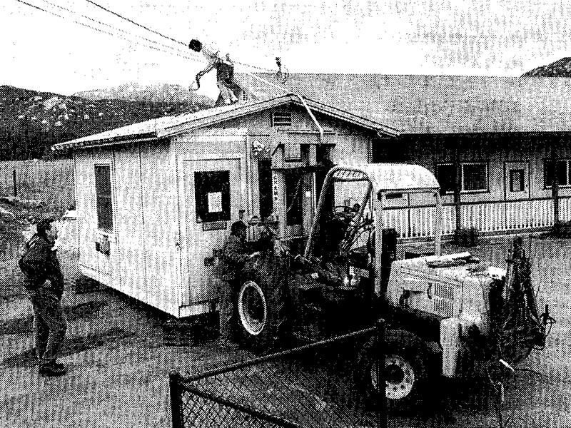 photo:moving the old library building.